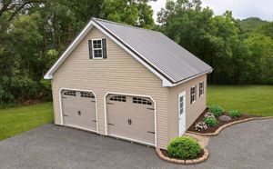 Our Garages service offers homeowners custom-built, durable garage solutions that seamlessly match your property's aesthetics, providing secure storage and enhancing functionality while boosting overall property value. for Rockhold Sheds in Deale, MD