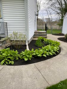 Enhance your garden's health and appearance with our professional mulch installation service, designed to retain soil moisture, suppress weeds, and enrich the landscape for a vibrant outdoor living space. for Z. Hastings Landscape Construction in Templeton, MA