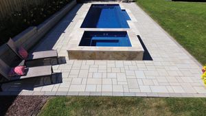 Our Outdoor Living service offers homeowners a complete package for transforming their outdoor spaces into functional and enjoyable areas, with amenities like seating areas, fire pits, lighting, and more. for Djosey Landscapes in Wilmington, NC