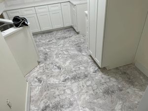Transform your home with our premium tile flooring service, offering a versatile and durable alternative to wood flooring. experience long-lasting elegance and easy maintenance tailored to enhance any living space. for Brooks Flooring in Burlington, NC