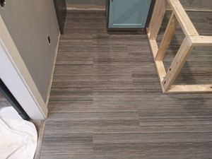 Our LVP Flooring service offers durable and low-maintenance luxury vinyl plank flooring options to enhance the appearance and functionality of your home. for JR Fuller Tile in Billings, MT