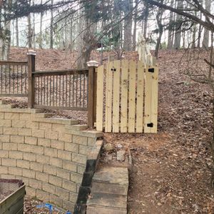 Enhance your home's security with our expert gate installation and repair services, providing efficient solutions to keep your gates functional and maintain their aesthetic appeal. Trust us for reliable, professional service. for Premier Fence in Marietta, GA