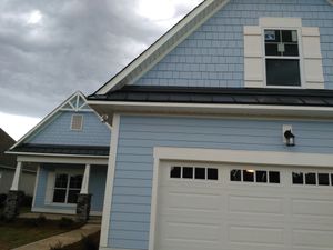 Transform your home's exterior with our professional vinyl siding installation services, ensuring durability and enhanced curb appeal for any vinyl siding house while safeguarding against weather elements efficiently. for Safe Roofing and Contracting Inc in Fayetteville, NC