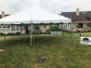 Our Tent service offers homeowners the perfect solution for hosting outdoor parties or events by providing high-quality and spacious tents that ensure a comfortable space for guests. for Adams County Bounce Houses, LLC in Decatur, IN