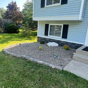 We offer professional stone wall installation to enhance your outdoor space. Our experienced team will ensure a quality build that you can be proud of. for Bielinski Bros Landscaping in Erie County, NY