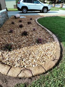 Transform your outdoor space with our natural stone hardscape services, creating stunning patios, walkways, and retaining walls that blend seamlessly with nature while enhancing the beauty and functionality of your home. for Ludlows Services in Davenport, FL