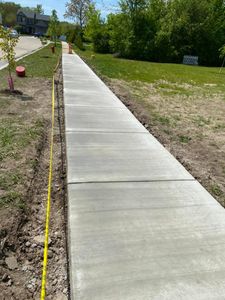 Our Sidewalk Installation service offers homeowners a professional and efficient solution for installing concrete sidewalks, enhancing the functionality and aesthetics of their properties. for D.R. Concrete  in Lincoln Park, MI