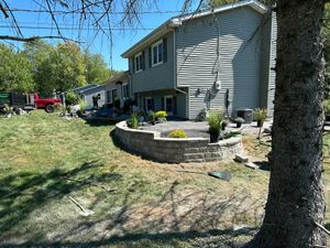 Our Retaining Wall Installation service is a great way to add value and curb appeal to your home. We use high-quality materials and our experienced professionals will install your wall quickly and efficiently. for Hauser's Complete Care INC in Depew, NY