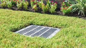 Our Lawn Drainage service effectively addresses water pooling issues on your property, preventing soil erosion and maintaining a healthy and aesthetically pleasing lawn. for Hipp's Land Management in Tryon, NC