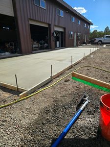 Our Concrete Driveway Installation service offers homeowners durable, visually appealing driveways using precision concrete pumping techniques, ensuring a smooth finish and long-lasting performance for enhanced curb appeal and property value. for Diamond Dust Concrete in Show Low, AZ