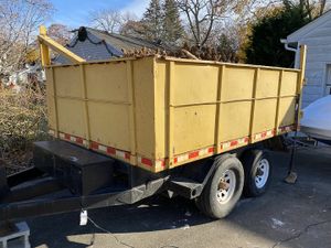 Our Dumpster Trailer Rental service provides convenient and affordable options for homeowners to efficiently dispose of unwanted waste or debris from their property. for Task Force Property Maintenance & Lawn Care in Columbia, Tennessee