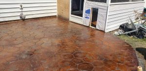 Stamped Concrete Installation is a premium service offered by our concrete company, providing homeowners with custom designed and textured concrete surfaces that mimic the appearance of high-end materials like brick or stone. for Low Country Concrete in Moncks Corner, SC