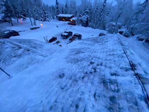 Our Snow Removal service ensures your roof is safely cleared of snow, preventing damage and leaks, while enhancing home safety and maintaining the structural integrity during harsh winter conditions. for Harris Roofing in Anchorage, AK