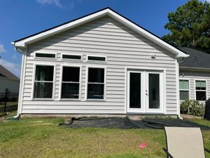 Our high-quality siding service offers homeowners a durable and visually appealing solution to enhance their home's exterior while providing protection from the elements. for Masters General Construction, LLC  in Shallotte, NC