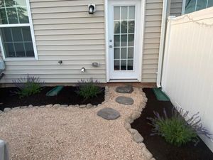 Enhance your landscape's beauty and health with our expert mulch installation service, which conserves moisture, prevents weed growth, and enriches soil for vibrant plant life. Transform your garden effortlessly today! for Beach Boy Grounds Maintenance LLC in Germantown, MD