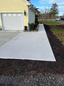 Discover what concrete can do for your home: our expert team offers durable, beautifully finished concrete solutions that enhance the functionality and aesthetic appeal of your outdoor spaces. for LodgeLawn LLC in Chesapeake, VA