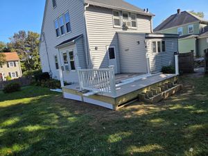 Our Deck Construction service offers homeowners custom-designed, durable decks that enhance outdoor living spaces. We use high-quality materials and skilled craftsmanship to create beautiful, functional extensions of your home. for Tuplin and Sons  in Braintree, MA