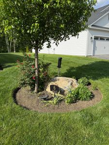 Enhance your lawn's health and beauty with our professional aeration service, promoting deeper root growth, improved water absorption, and reduced soil compaction for a lush, vibrant yard year-round. for Navedo’s Lawn Care in Putnam, CT