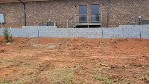 Our retaining wall construction service is perfect for homeowners who want to add extra stability and support to their property. We use high-quality materials and experienced professionals to construct a retaining wall that will last for years. for AJC Lawn Care, LLC in Atlanta, Georgia