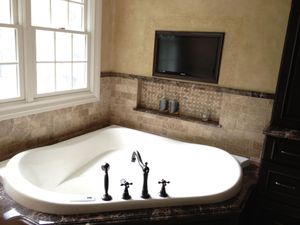Our Bathroom Remodeling service offers comprehensive solutions to transform your bathroom into a stylish and functional space tailor-made to meet your unique needs and aesthetic preferences. for Ferrer's Interiors in Centerton, AR