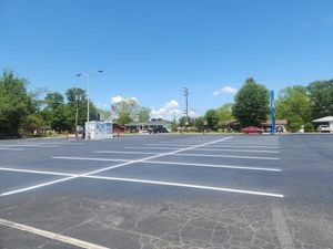 Our Industrial Sealcoating service provides a protective layer for your driveway or parking lot, prolonging its lifespan and enhancing its appearance. Trust us to protect and beautify your property. for Johnson's Sealcoating & Painting in Inman, SC