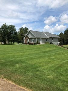 Our expert mowing service ensures a perfectly manicured lawn, enhancing your home's curb appeal. We guarantee timely and precise cutting, promoting healthy grass growth for a lush and vibrant landscape year-round. for Mountain View Lawn Care and Detail in Seneca, SC