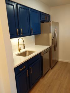 Transform your kitchen with our expert cabinet refinishing service. We restore the beauty of your existing cabinets, offering a cost-effective solution that enhances durability and refreshes the heart of your home. for I&E Home Solutions in Northglenn, CO