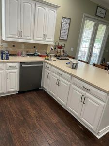 "Our Kitchen and Cabinet Refinishing service provides homeowners with a cost-effective solution to transform their outdated kitchen cabinets into beautiful, modern pieces using our skilled painting techniques. for Bobby Thompson Painting LLC in Lakeland Highlands, Florida
