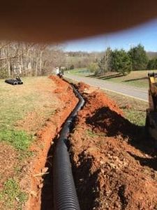 Our expert excavating contractor ensures seamless septic installations and repairs, providing efficient and reliable solutions to maintain your system's performance and safeguard your property's environmental health. for CST Dirt Solutions in Rowan, NC