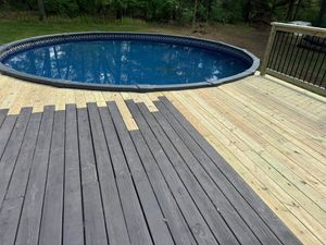 Enhance your deck's beauty and longevity with our expert painting and staining services. Our team ensures a flawless finish that not only protects but also revitalizes your outdoor space. for Risner Construction in De Motte, IN