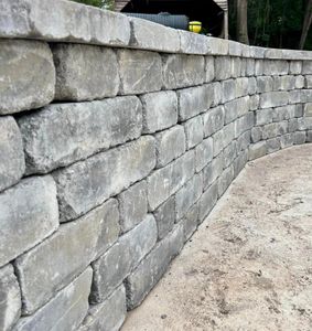 We provide professional retaining wall construction services for homeowners to create a beautiful, functional outdoor space that will last for years. for Elite Landscaping LLC in Anderson, SC