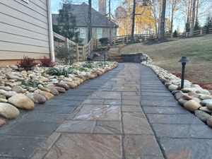 Our Hardscaping service offers durable and stunning features such as pathways, walls, and patios that enhance the functionality and aesthetic appeal of your outdoor space. for Hydra-Nomix  in Canton,  GA