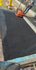 Our Asphalt service provides a durable and smooth alternative for your driveway or walkway needs, offering easy maintenance and long-lasting performance for your home's outdoor spaces. for Burning it Concrete LLC in Raleigh, NC