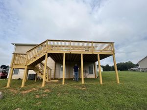 Our Deck Staining service offers professional and efficient solutions to homeowners looking for expertly stained decks that enhance the aesthetic appeal and longevity of their outdoor spaces. for Top Notch Painting and Remodeling in Vinton, VA