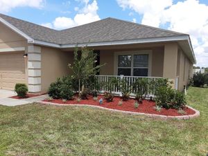 Enhance your garden's beauty and health with our professional mulch installation service, which helps retain moisture, suppress weeds, and improve soil quality while adding a polished look to your landscape. for Ludlows Services in Davenport, FL