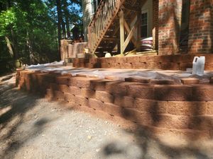 Our Retaining Wall Construction service is perfect for homeowners who are looking to add some extra stability and support to their property. We have a wide variety of retaining wall options available, so you can find the perfect solution for your needs. for Flori View Landscaping LLC in Durham, NC