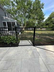 Enhance your home's security and curb appeal with our expert gate installation and repair services, specializing in durable vinyl fencing that combines style with long-lasting reliability for peace of mind. for Modern Fence NH in Atkinson, NH