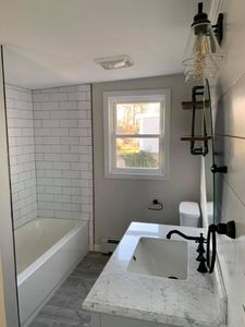 Revitalize your space with our expert bathroom renovation services, blending style and functionality. We transform outdated bathrooms into modern sanctuaries tailored to your unique preferences and needs, ensuring unparalleled craftsmanship. for Cahill Builders in New Bedford, MA