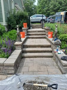 Transform your outdoor spaces with our Stamped Concrete Installation service. Our skilled team will create beautiful and durable designs that perfectly complement your home's style and enhance curb appeal. for Tony Reardon & Sons in Seabrook,  NH