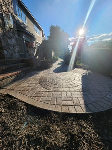 Our hardscaping services provide homeowners with beautiful, functional outdoor spaces using materials such as stone, brick and concrete. We can create patios, walkways, retaining walls and more to enhance your home's exterior. for Lamb's Landscapes & Hardscapes in Syracuse, New York