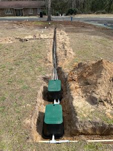 Enhance your landscape with our expert irrigation system design and install service, ensuring lush greenery. Pair this with stone veneer installation for a stunning, durable outdoor transformation that elevates curb appeal. for Linhale Landscaping & Lawn Care in Florence, SC