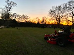 Our Mowing service provides professional and reliable lawn care to keep your yard looking its best. We use top-of-the-line equipment for a clean, precise cut every time. for Little Family Landscaping in Pensacola, FL