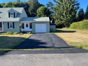 Enhance your driveway's durability and appearance with our expert seal coating service, offering protection against weather damage, UV rays, and daily wear while extending the life of your asphalt surface. for Reynoso’s Asphalt Service in Leominster, MA