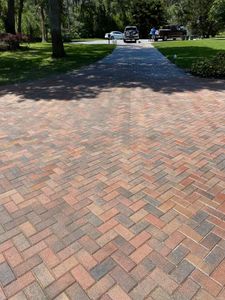 Our Driveways service offers homeowners a beautiful and durable solution for their driveway needs. Our pavers are installed by experienced professionals, and we offer a wide variety of colors, styles, and sizes to choose from. We also offer maintenance services to keep your driveway looking its best for years to come. for Fafa's Omega Brick Pavers in Lakeland, FL