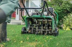 Our Aeration Over-Seeding service revitalizes your lawn by loosening soil and adding new grass seeds, resulting in improved root growth and a thicker, healthier lawn. for Hipp's Land Management in Tryon, NC