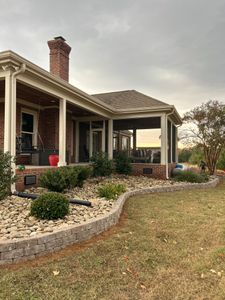 Enhance your outdoor space with our river rock beds service, providing a natural and elegant ground cover that improves drainage, prevents erosion, and adds timeless beauty to your landscape design. for Alvarez Landscape & Hardscape Service in Rock Hill, SC