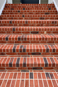 Our Small Brick Repair service expertly addresses damaged mortar joints through repointing and tuckpointing, restoring your home's brickwork to enhance structural integrity and aesthetic appeal alongside our comprehensive pressure washing solutions. for LeafTide Solutions in Richmond, VA