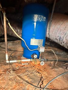 Our Well Pumps & Tanks service ensures that your water supply is consistently functioning properly, providing you with peace of mind and efficient access to clean water for your household needs. for Purified Plumbing Services INC in Leasburg, NC
