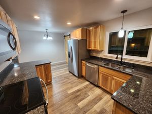 "Our Kitchen Renovation service offers homeowners a comprehensive solution to transform their kitchen with expert craftsmanship and quality materials, ensuring functional design and stunning aesthetics. for S&R Family Construction LLC in Winston, OR