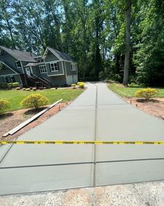 Enhance your home's curb appeal with our professional stamped concrete installation service, offering durable and stylish driveway solutions that combine functionality with aesthetic charm for a long-lasting investment in your property. for 4 Season Concrete LLC in Atlanta, GA